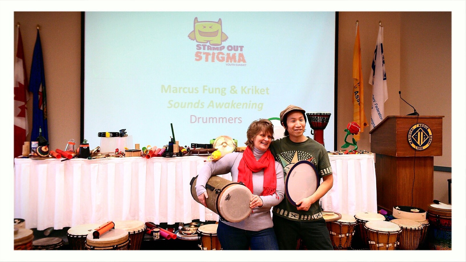 A drum circle workshop at a conference