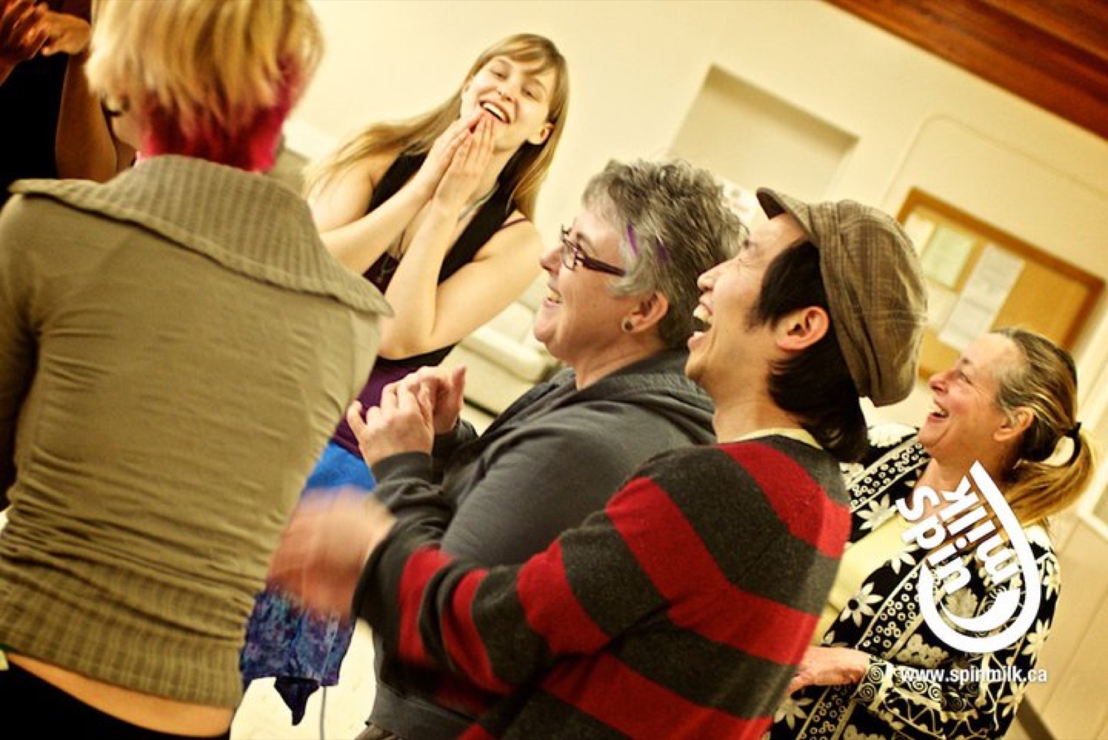 Participants laughing together during a session